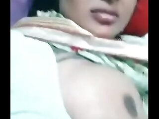 tamil milf exhibiting a resemblance the brush boobs on t. integument